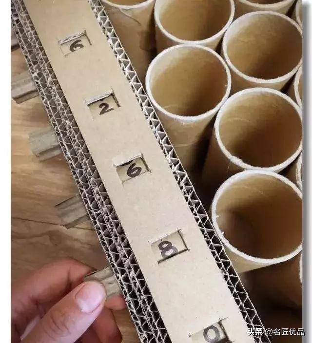 废旧纸箱手工制作大全（幼儿园纸板双层停车场）