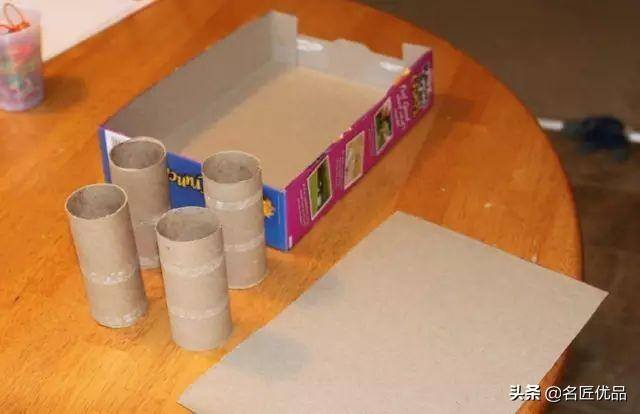 废旧纸箱手工制作大全（幼儿园纸板双层停车场）