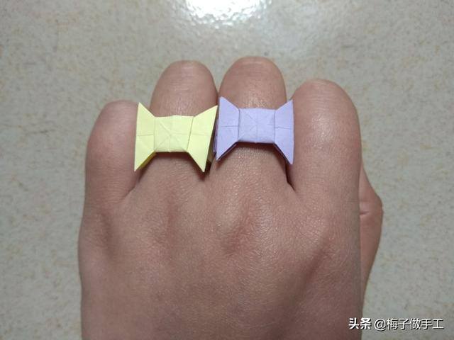 长方体怎么做手工制作（教你用一张纸怎么折一颗蝴蝶结戒指，折法简单又漂亮）