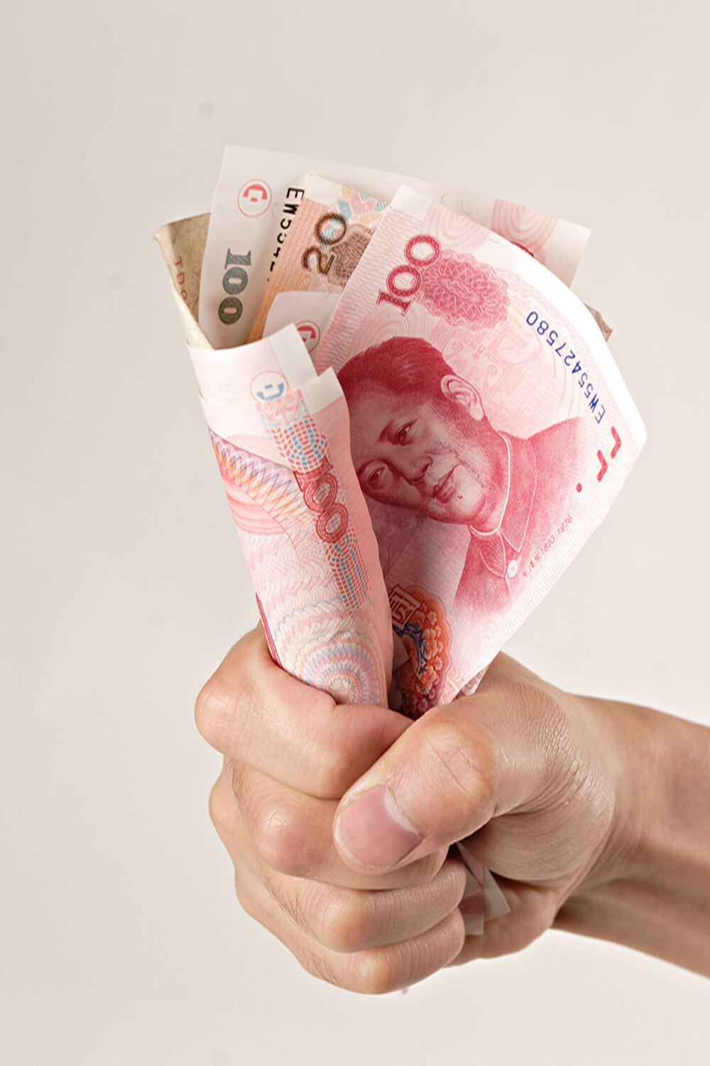 1吨100元人民币有多少钱